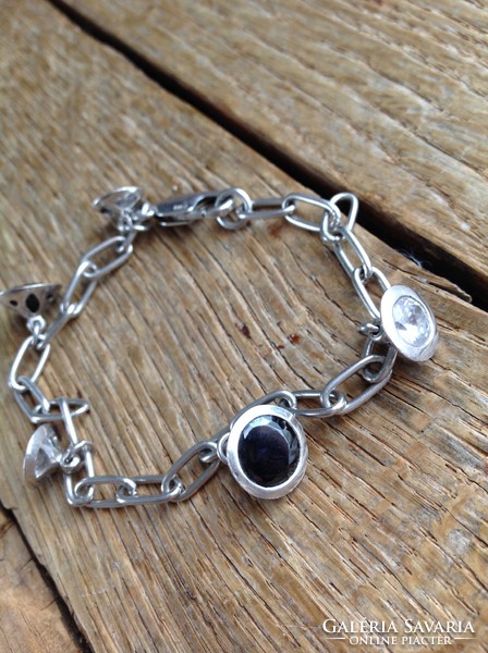 Silver bracelet with polished black onyx and crystal stones