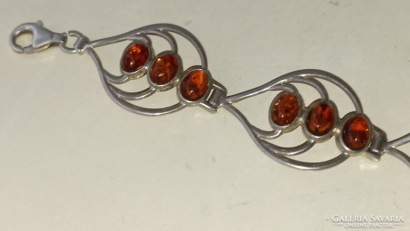 Silver bracelet decorated with amber stones 925