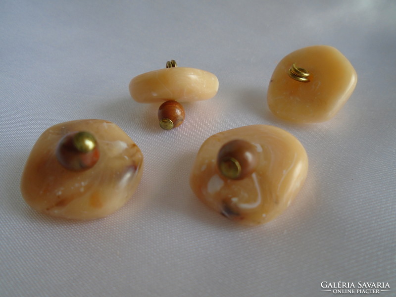 4 pcs. Antique amber art deco buttons with copper fittings.