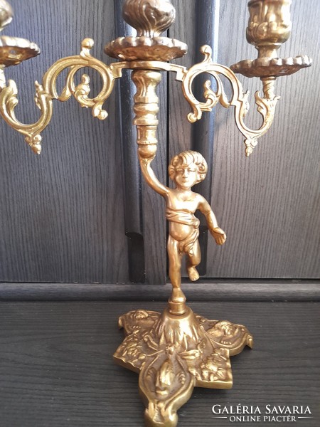 Old copper putto candle holder