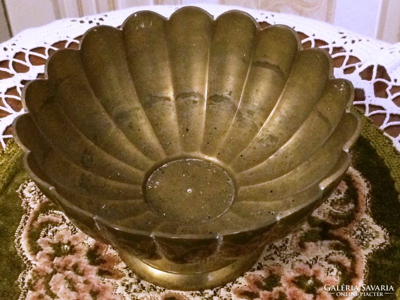 A special, flower-shaped, medium-sized, old brass pot