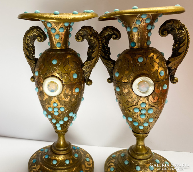 Pair of old ornate oriental vases.