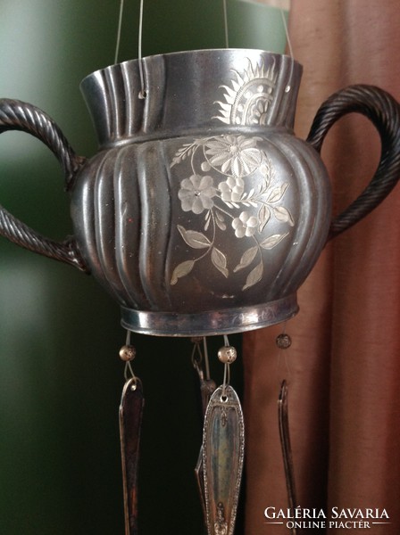 Wind chime made of old silver-plated cutlery and utensils