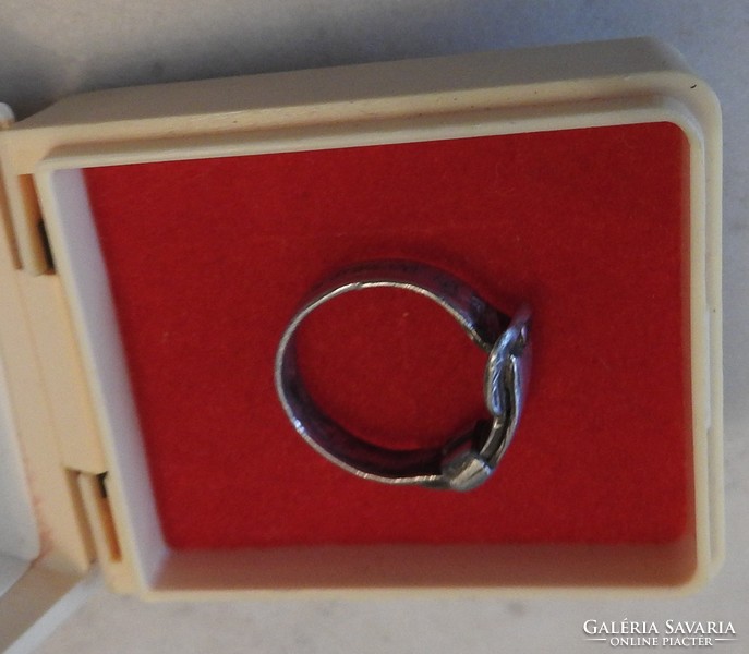 A rare silver ring with a belt pattern