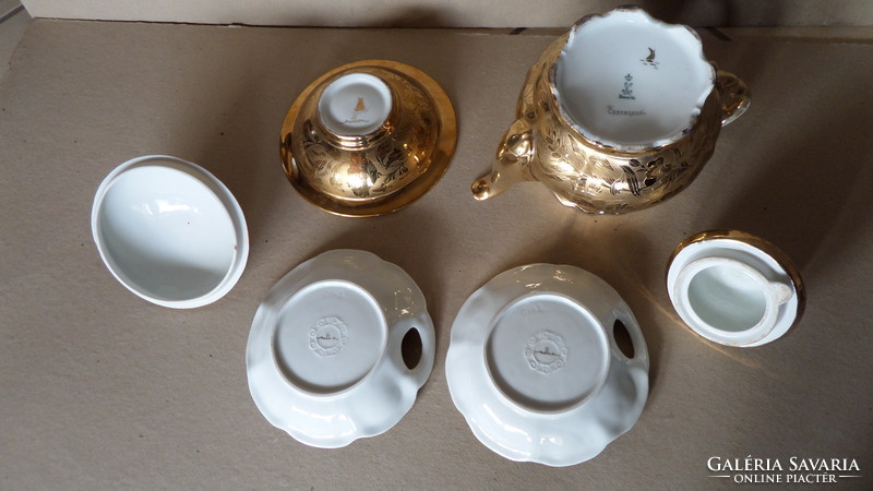 Fire-gilded bavaria, uniquely marked teapot, with sugar holder and bowls