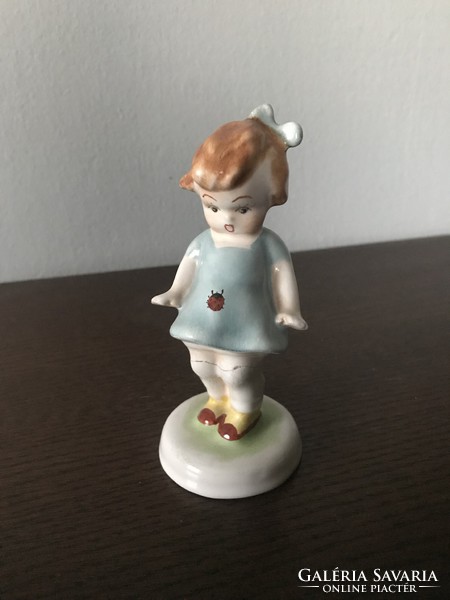 Bodrogkeresztúr ceramic girl in a blue dress with a ladybug sculpture figurine rib