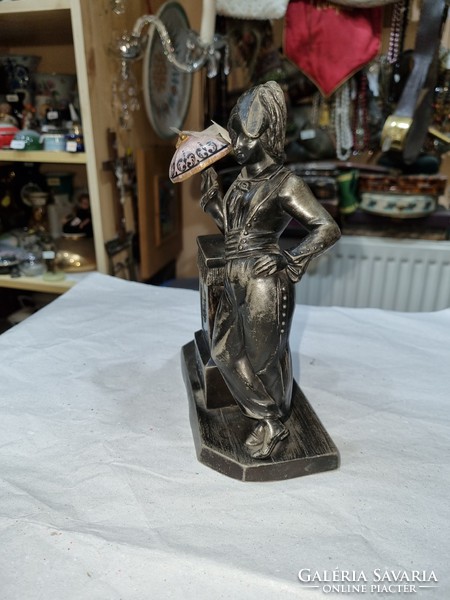 Old tin figure