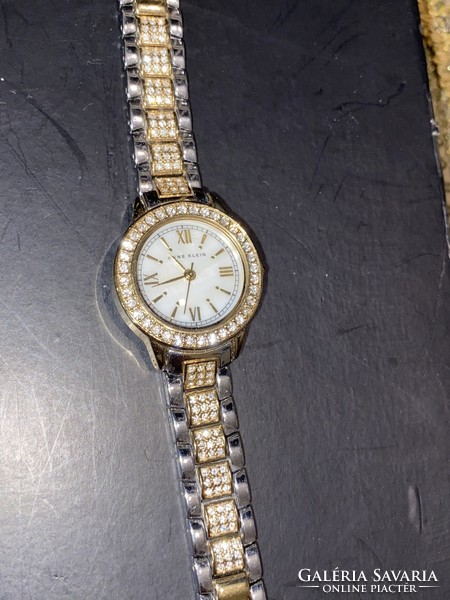 Anne klein pearl watch with crystal stones.