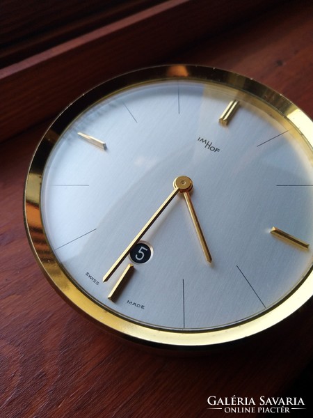 Imhof is an 8-day Swiss table clock dated