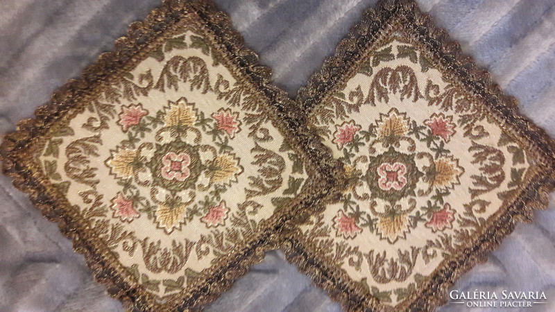 Antique tapestry-like brocade tablecloth pair in a shop window (m 2143)