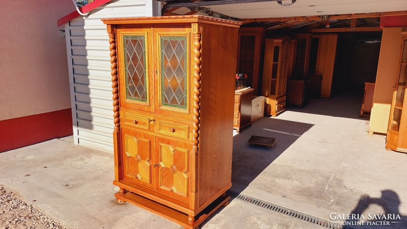 Colonial bar cabinet in nice condition for sale.