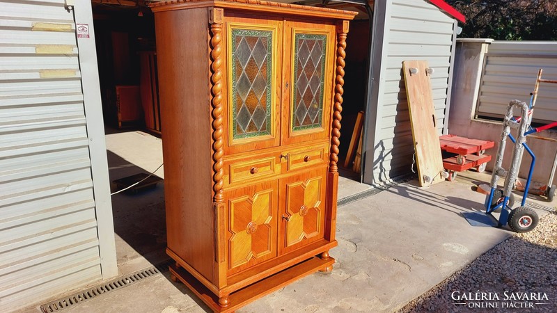 Colonial bar cabinet in nice condition for sale.
