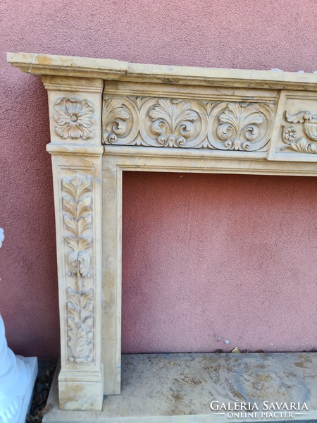 Brown-beige marble fireplace frame