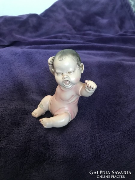 A. Lucchesi baby figure sculpture yawning infant
