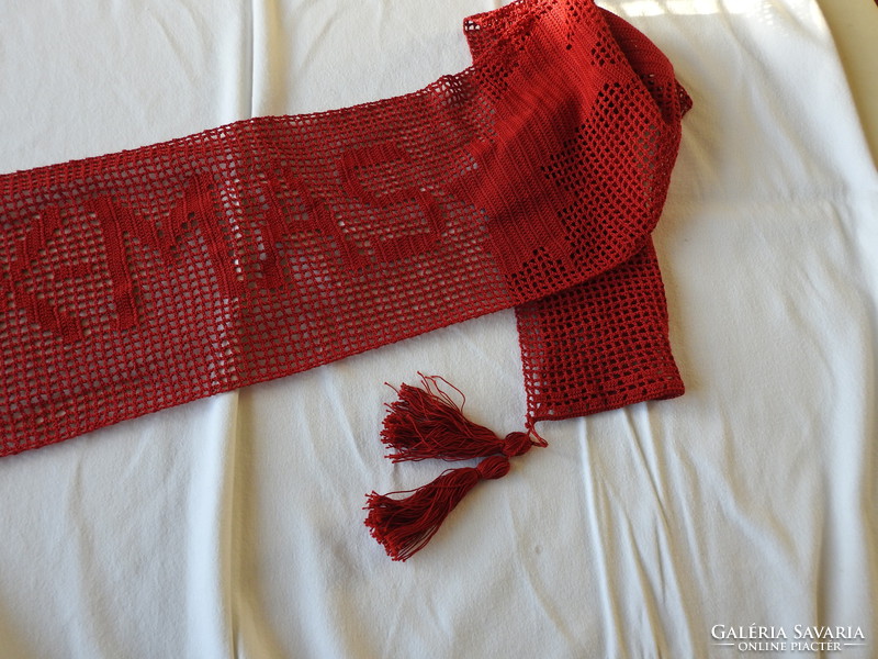 Red big scarf with fringed ends crocheted with stars with the inscription Marry- xmas