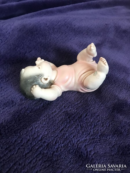 A. Lucchesi baby figure sculpture yawning infant