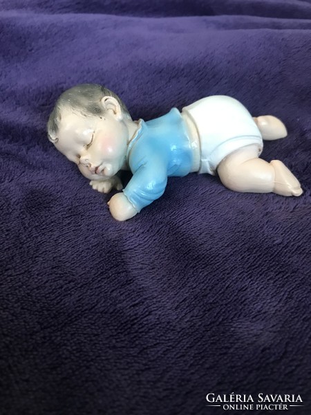 A. Lucchesi's well-known baby figure is a baby statue sleeping figure