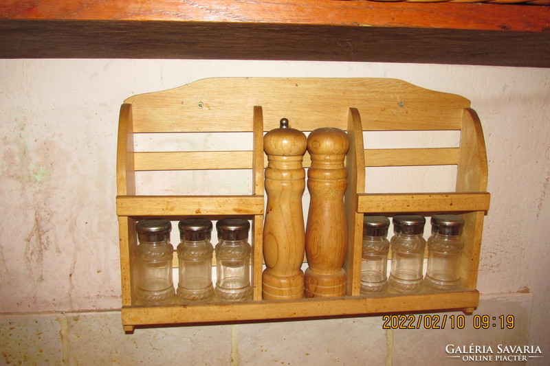 Retro spice rack on wooden shelf + accessories