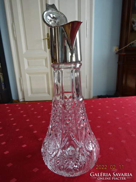 Polished glass, English wine jug with silver-plated spout. He has!