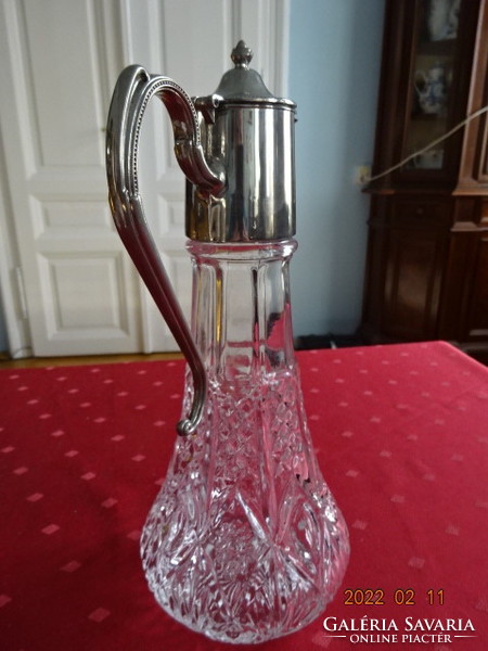 Polished glass, English wine jug with silver-plated spout. He has!