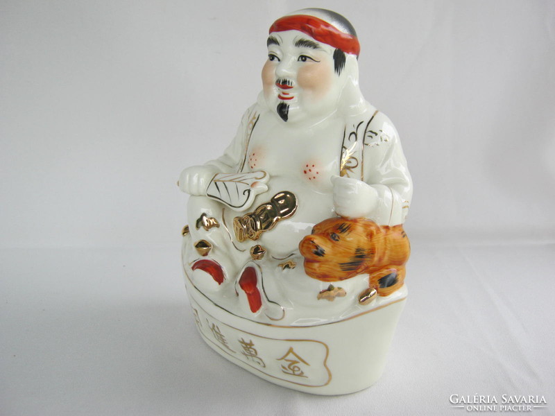 Japanese porcelain lucky figure