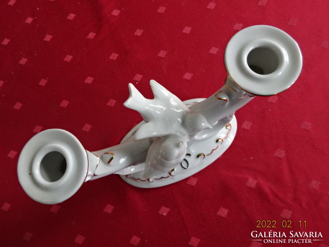German porcelain two-pronged candlestick with two white doves. He has!