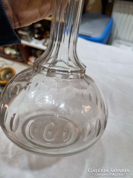 Old peeled crystal bottle