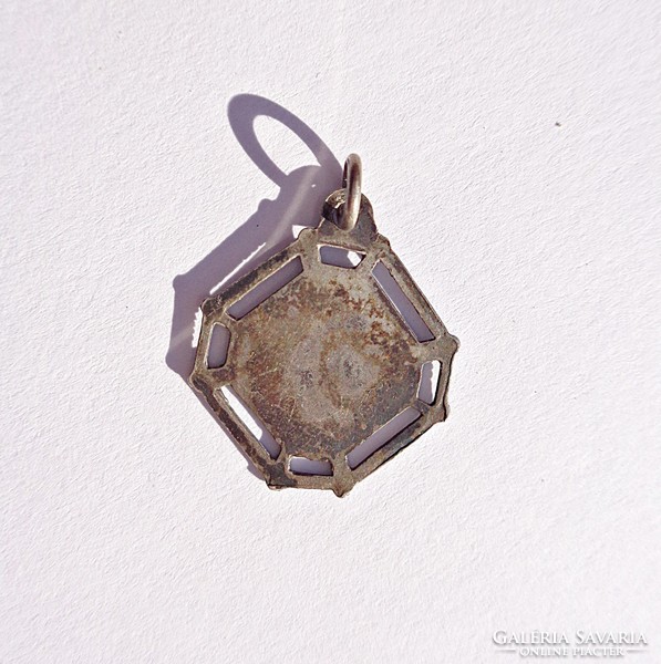 Silver pendant depicting an old fire enamel chimney sweep