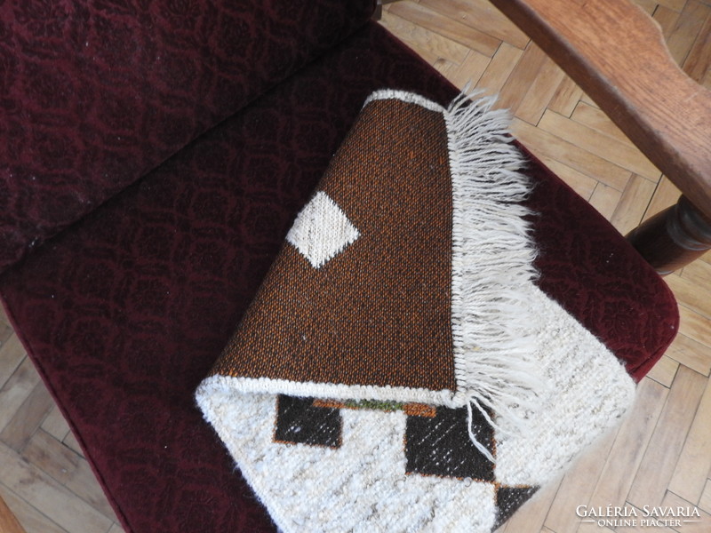 Retro geometric pattern with fringed carpet
