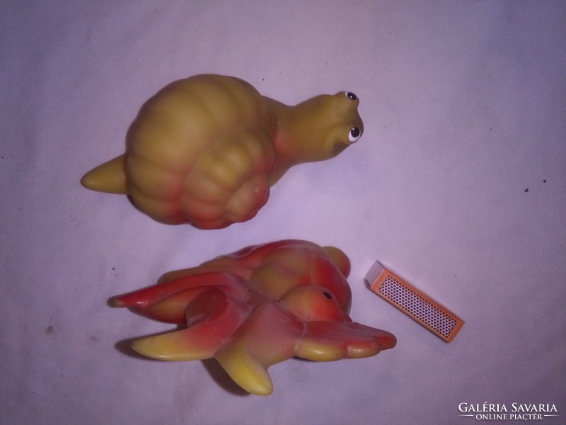 Old beeping, whistling rubber toy rooster and snail - together