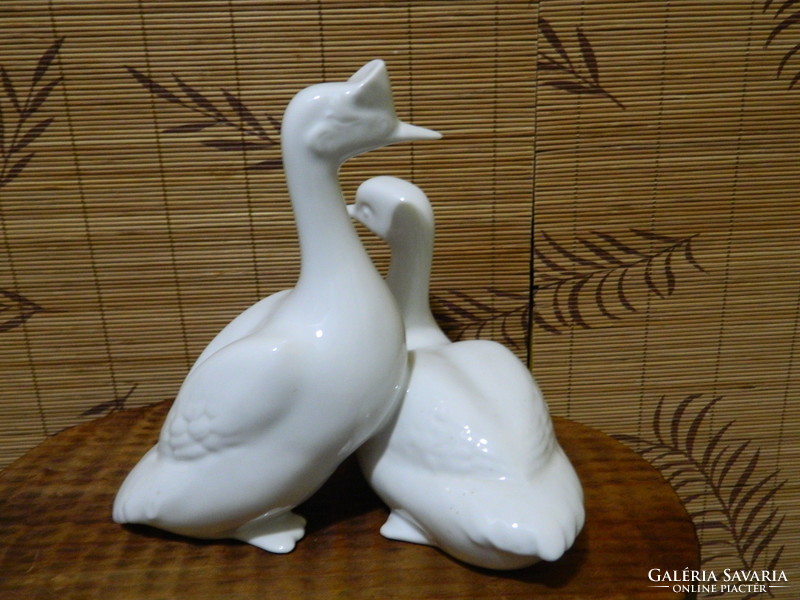 A pair of ducks with a raven house glaze
