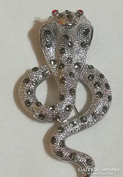 Snake brooch.