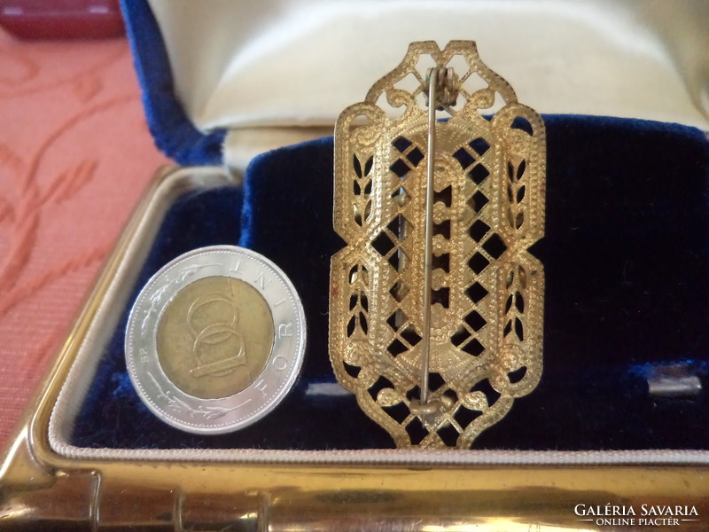 Antique filigree brooch with red stones