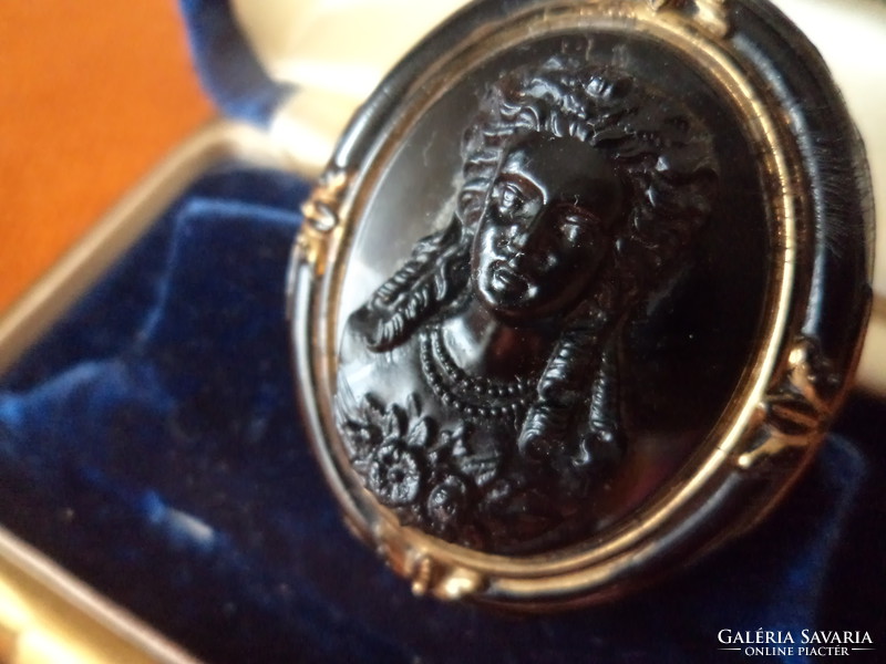 Antique cameo on an onyx background