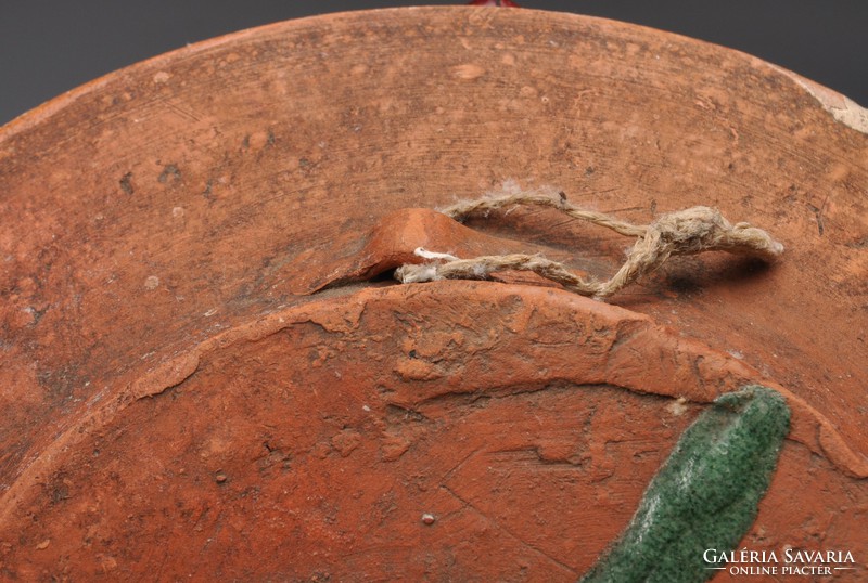 Old tile plate, Transylvanian customs village, 19. Sat. End, tile with hooks.