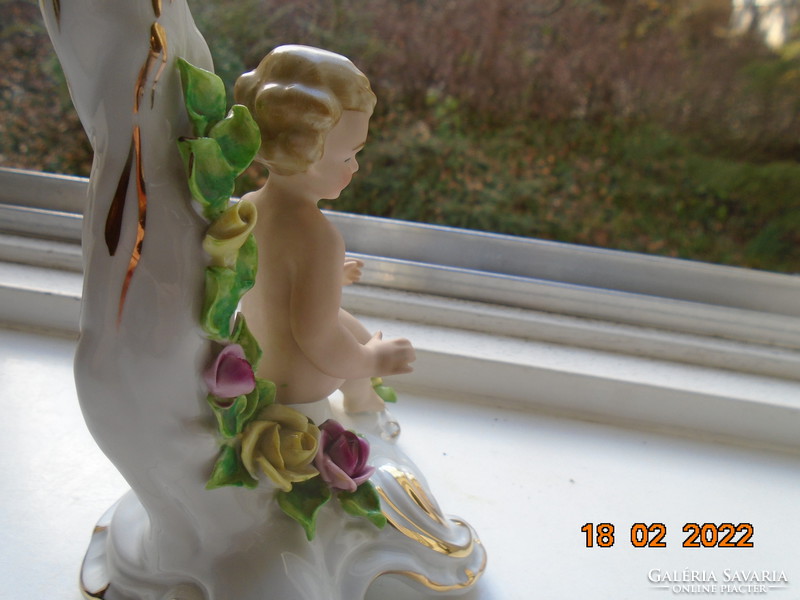 Dresden putto candlestick with handmade colorful plastically embossed flowers