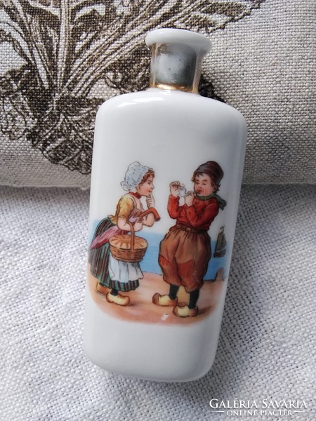 Antique partly hand painted porcelain perfume with Dutch folk costume motif