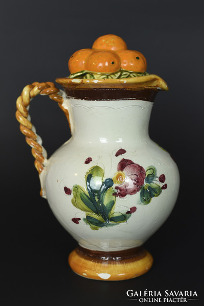 Italian painted ceramic jug with braided handles