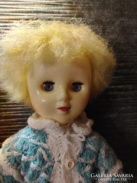 Old beautiful pale-faced toy doll antiques about 60 cm high for collectors