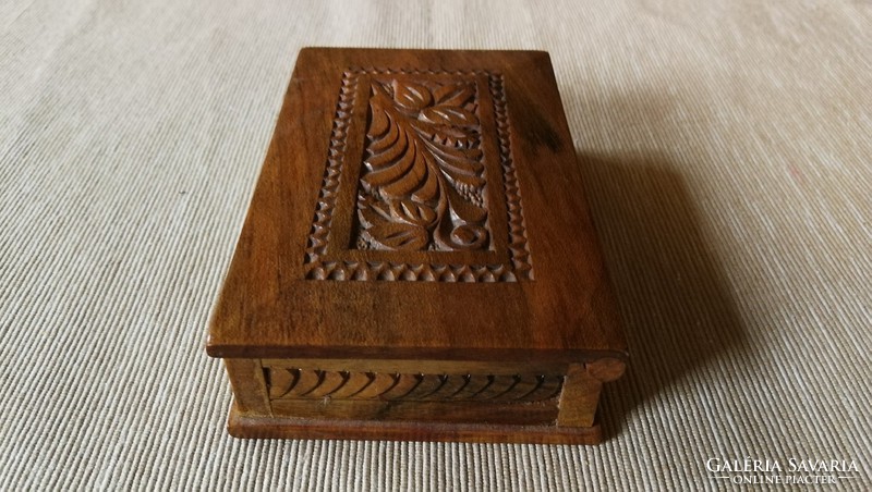 Old carved wooden box.