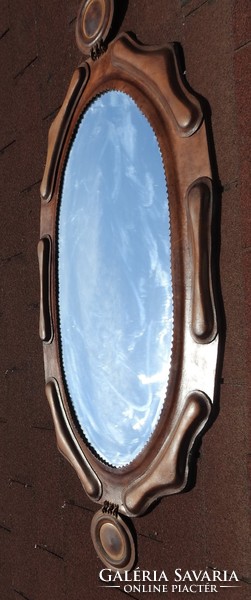 Giant wall mirror with leatherwork