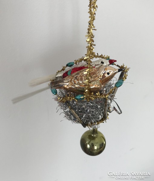 Birds nest in Christmas tree decoration