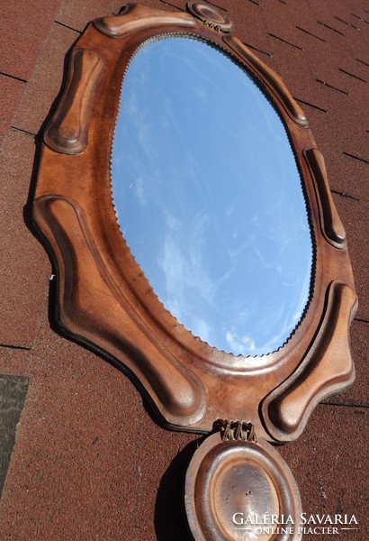 Giant wall mirror with leatherwork