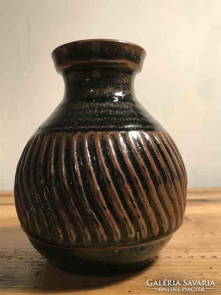 Marked small vase-dark colored vase t-144