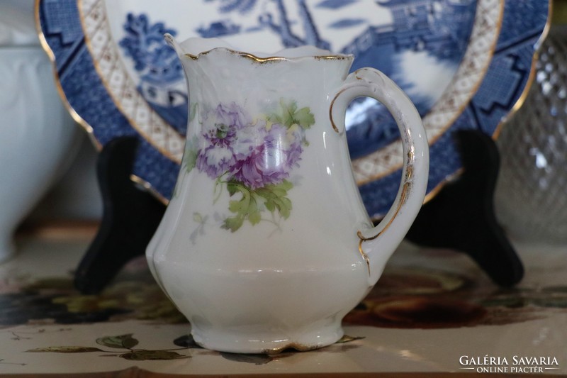 Ornamental patterned milky, creamy jug