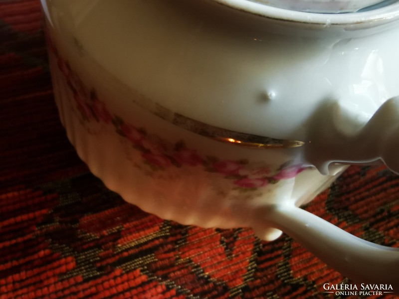 Pink porcelain sugar bowl from the early 1900s to the late 1980s.