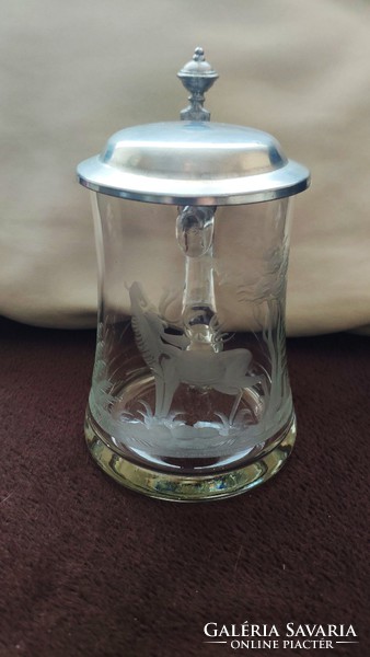 Hunter scene with polished glass jar with tin lid