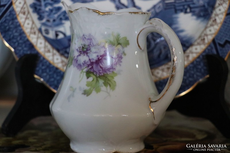 Ornamental patterned milky, creamy jug