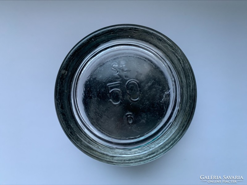 Old pharmacy bottle with vinyl record lid