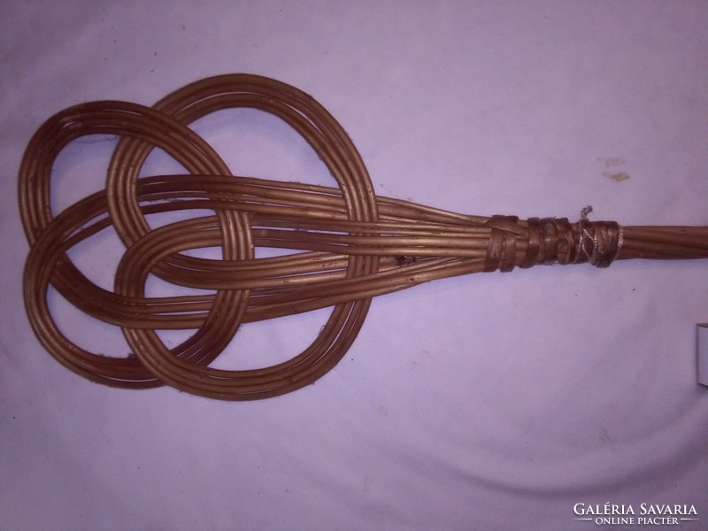 Old wicker hand carpet duster